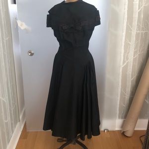 Vintage 1950s black dress. See beautiful shoulder